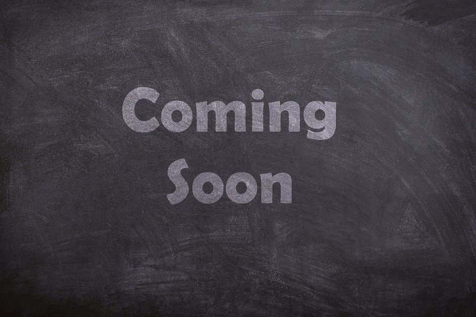 black board with the inscription "coming soon"